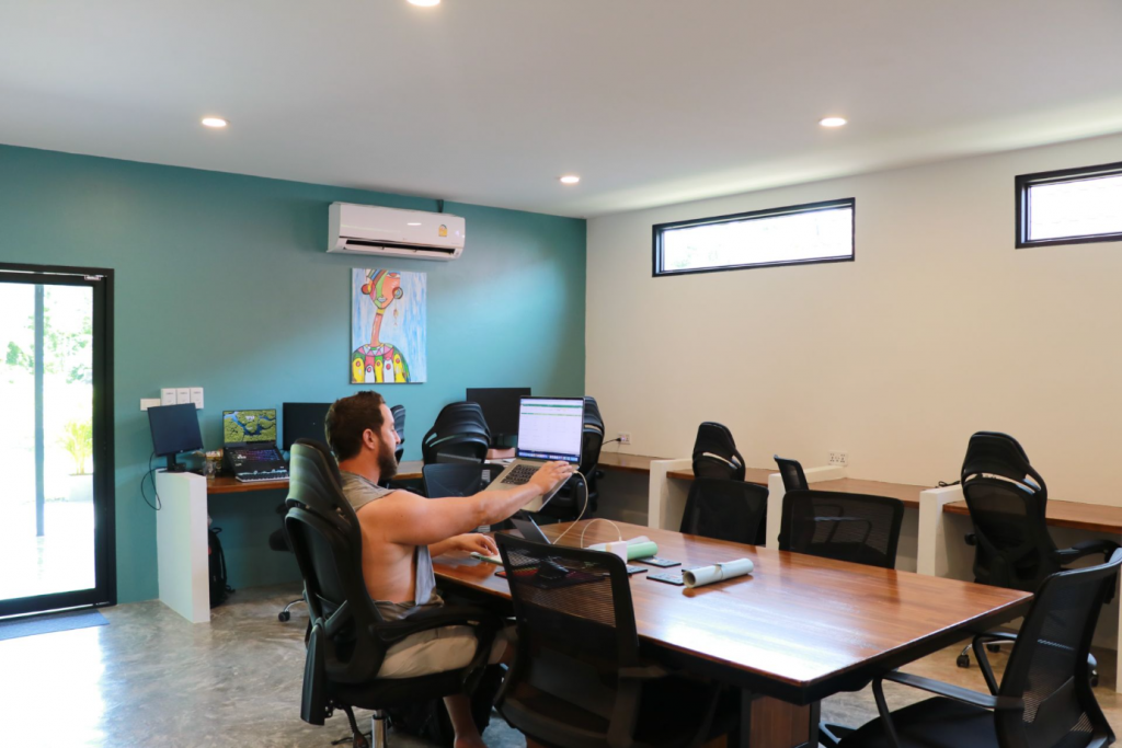 Digital nomad working in a modern coworking space in Phuket, Thailand